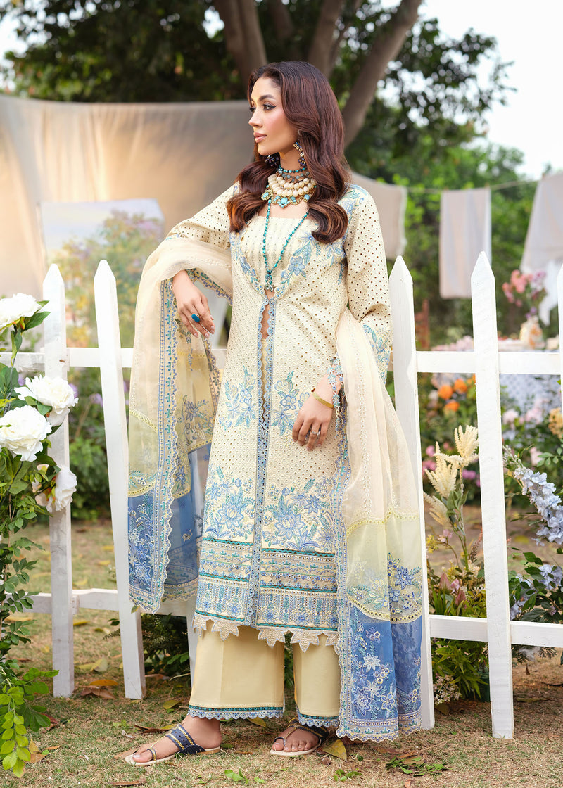 Woman in a traditional outfit with floral patterns in an outdoor setting