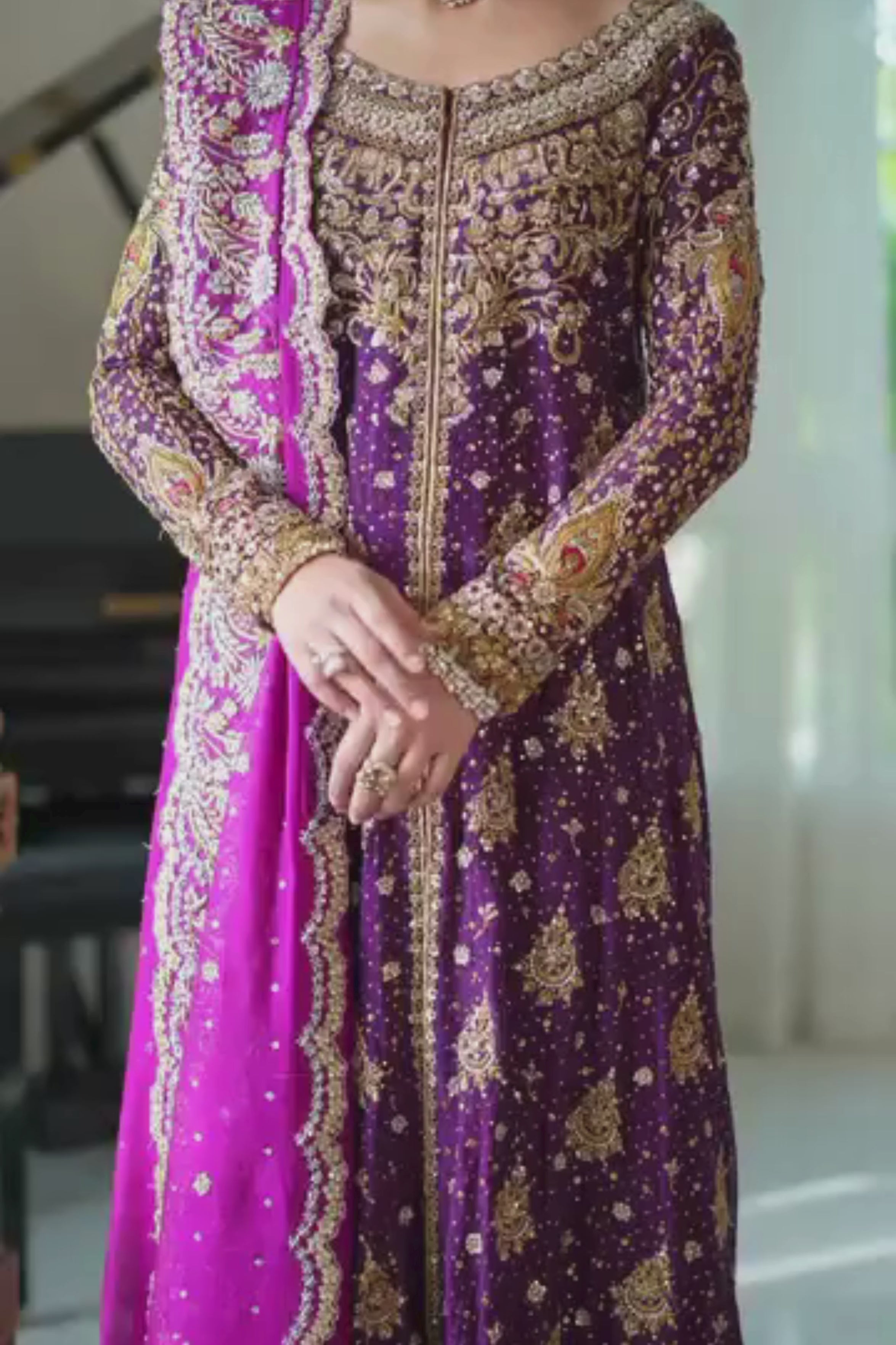 Beautiful Women wearing purple and pink  traditional lahenga wedding dress